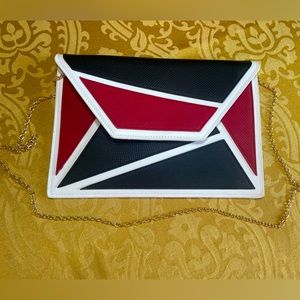 Geometric colored envelop clutch